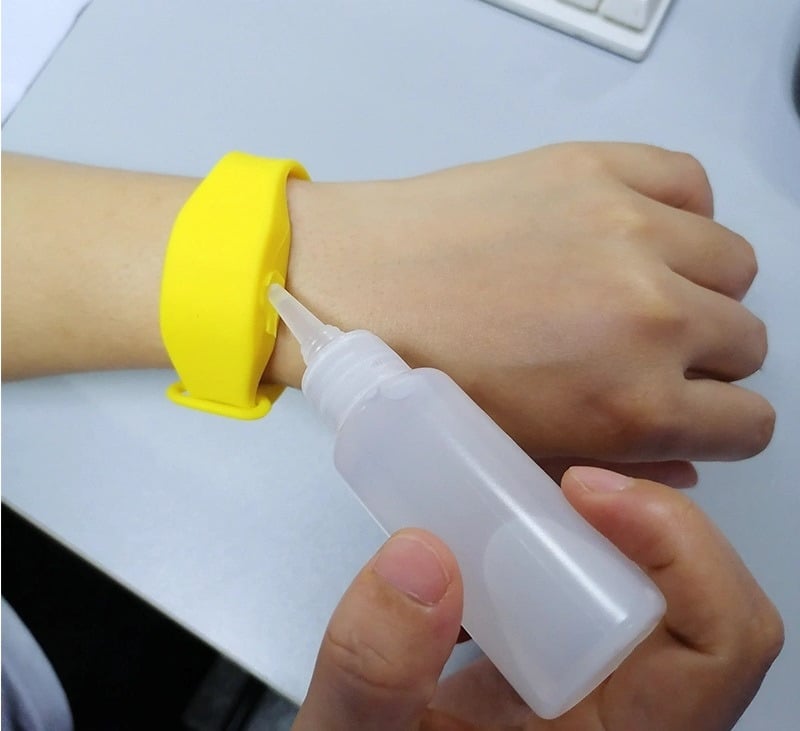 Handsan Wrist Review: filling it with sanitizer
